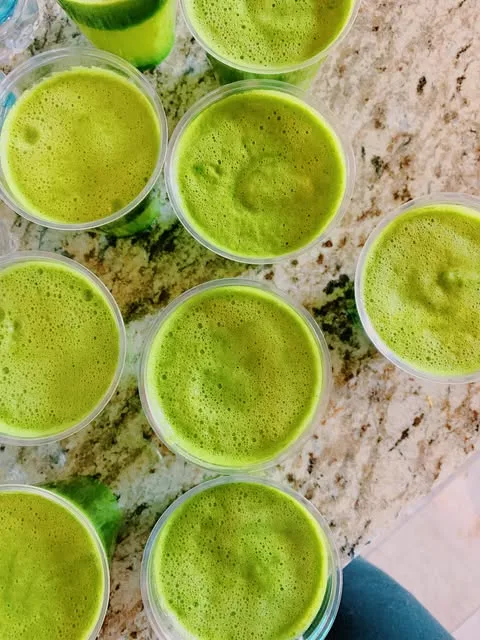 Fresh green juices prepared for the group